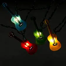 LED guitar-shaped lights on black background