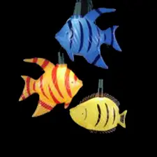 Colorful fish lanterns on black background