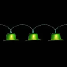 Green hat string lights on black background