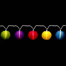 Vibrant hanging lanterns on black background