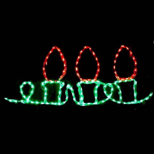 Festive candle lights in darkness