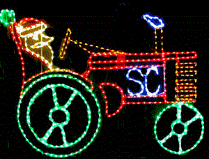 Festive tractor light display with Santa